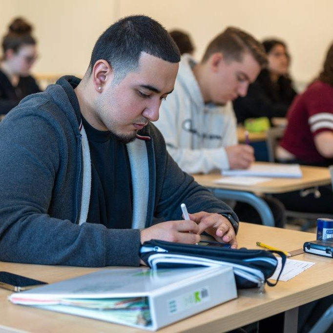 students taking notes during math class